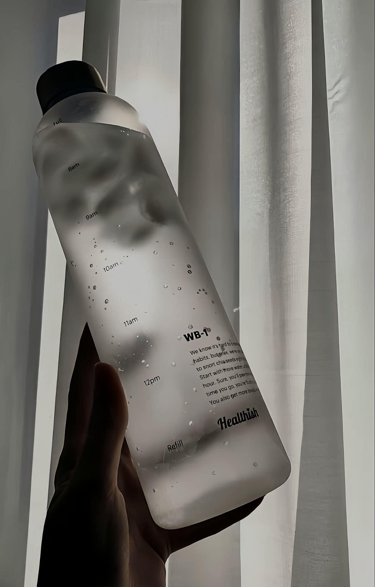 Person drinking water next to iron-rich foods representing ferritin recovery timeline