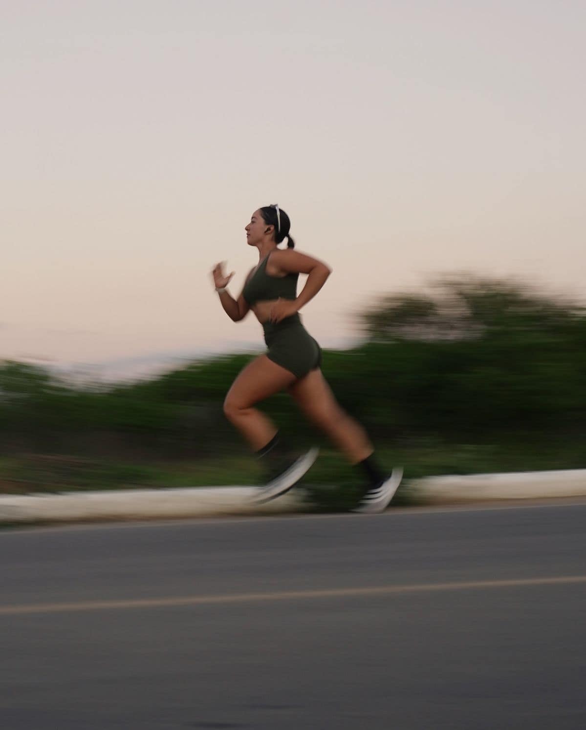 Woman experiencing fatigue during exercise due to low ferritin iron stores